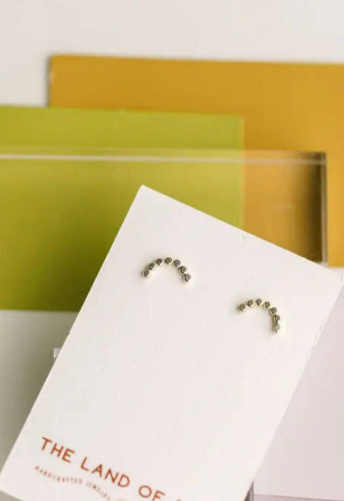 The Land of Salt Hammered Dot Arch Stud Earrings