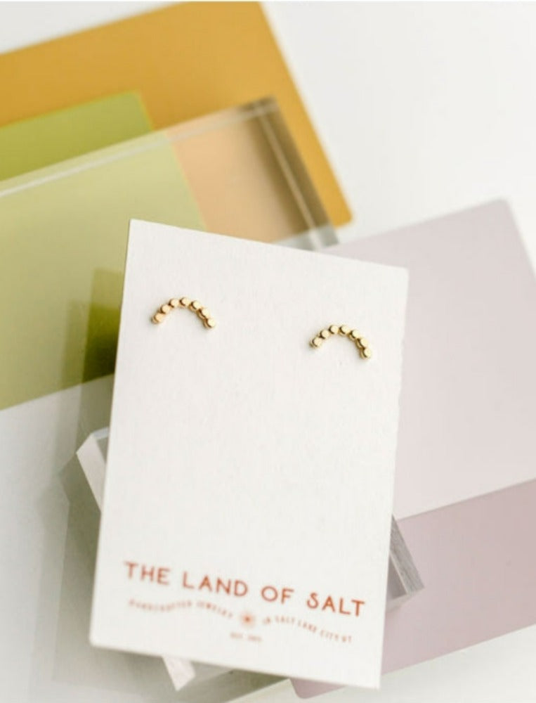 The Land of Salt Hammered Dot Arch Stud Earrings Gold